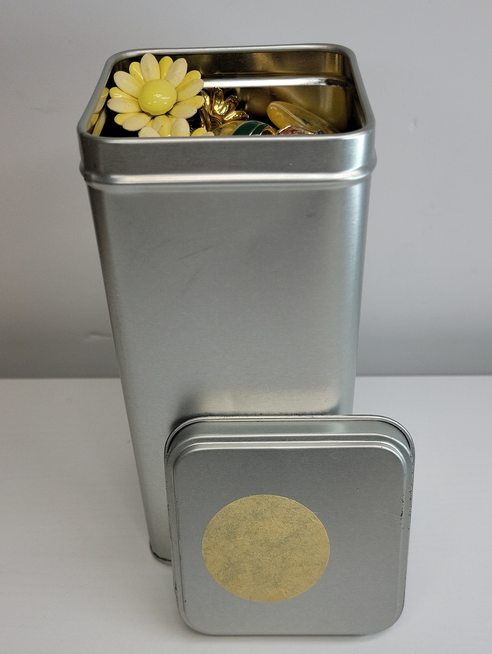 Silver Metal Storage Tin Filled With Clip On Earrings